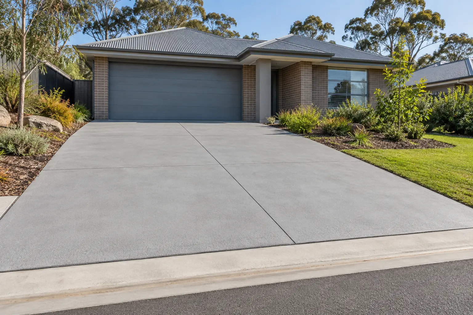 A finished concrete driveway